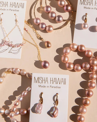 styling pink pearl bracelet with elegant earrings and necklaces from Misha Hawaii catalog