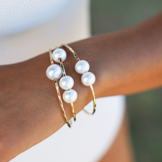 White Pearl Bangle Set of Three Bangles in Gold handmade in Hawaii on wrist