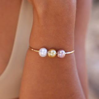 Lana'i Pearl Bangle set of three bangles in Gold made in Hawaii on wrist