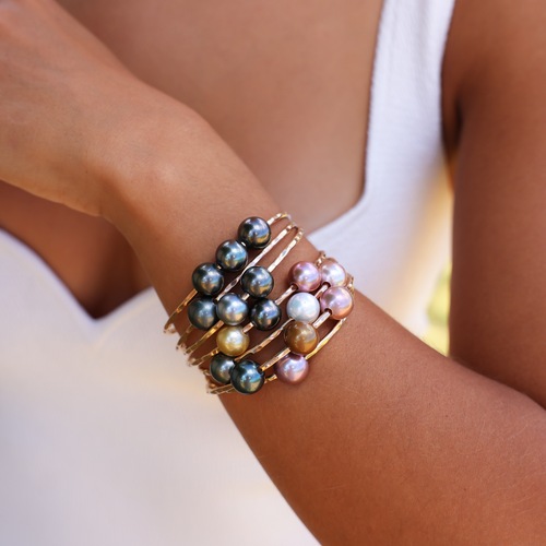 multicolor pearl bangle in gold made in Hawaii on wrist