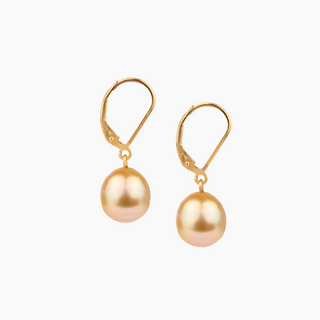 A pair of leverback earrings featuring golden south sea pearls with a gold-filled earwire.