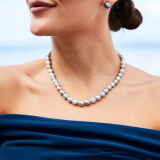 Model wearing a Tahitian silver pearl strand handcrafted in Hawaii