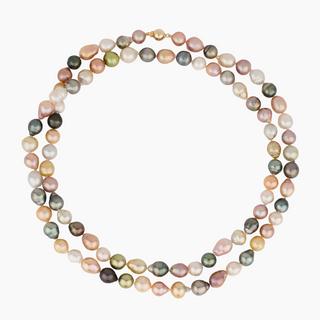 Close-up of multicolor Tahitian, Edison and pistachio pearls on hand-knotted strand by Misha Hawaii
