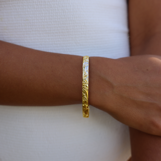 Hawaiian Heirloom Bangle in silver handcrafted in Hawaii on wrist