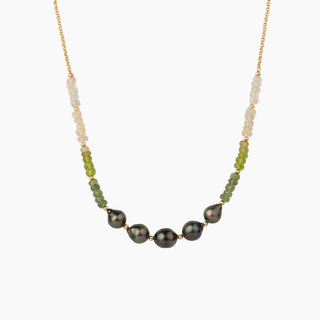 Tahitian black pearl necklace with green gemstones and gold chain
