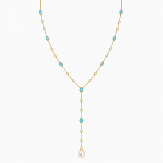 A delicate gold Y-necklace featuring small round and oval turquoise-blue stones, a central teardrop-shaped blue stone, a dangling pearl at the bottom, and tiny clear stones along the chain, shown on a plain white background.