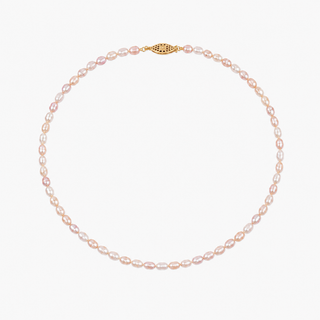 A delicate necklace made of small, light pink freshwater pearls arranged in a circle, featuring a gold-tone evil eye clasp at the top, set against a plain white background.