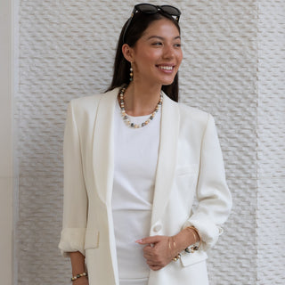 Multicolor pearl earrings, tahitian pearls and golden south sea pearls with gold leverbacks on model