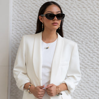 multicolor pearl necklace, tahitian pearls and golden south sea pearls float on gold chain on model