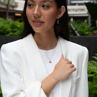 Pink Keshi Pearl earrings in 14k gold on model