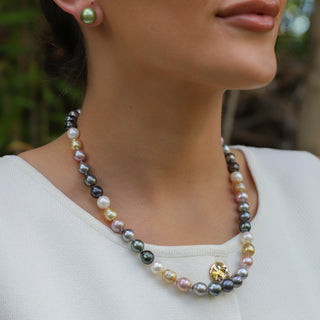 multicolor rainbow pearl strand with gold clasp on model
