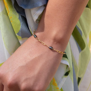 Tahitian keshi Pearl bracelet in gold on wrist