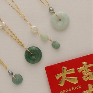 Jade necklace on gold chain
