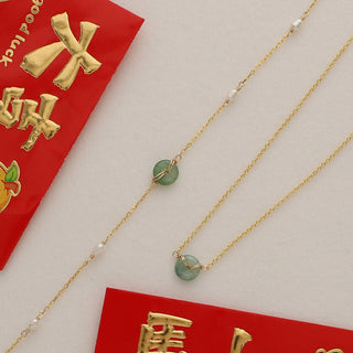Flat lay of Jade bracelet in gold handcrafted in Hawaii