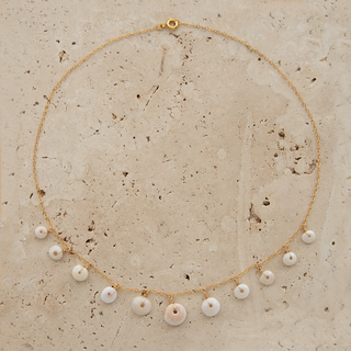 Puka Shell necklace on gold chain