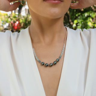 Tahitian Pearl Necklace with blue gemstones and gold chain on model