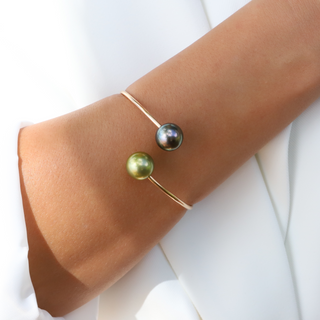Tahitian Pearl and Pistachio Pearl Cuff in Gold on wrist