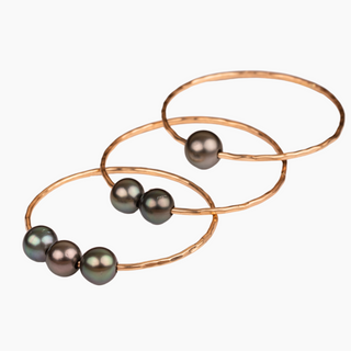 Set of three tahitian pearl bangles in gold made in Hawaii