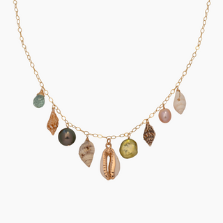 Shell and pearl necklace on gold chain