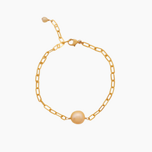 Load image into Gallery viewer, Gold bracelet with a single golden south sea pearl on a white background