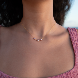 Pink Keshi pearl necklace handcrafted in Hawaii on model neck