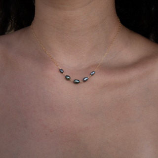  Tahitian Keshi black pearl necklace handcrafted in Hawaii on neck