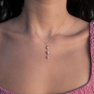 pink pearl necklace on model