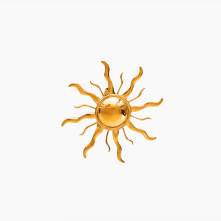Gold sun-shaped brooch