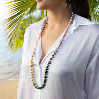 rainbow pearl strand with gold clasp on model