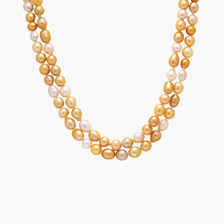 Golden south sea pearl strand with gold clasp on model
