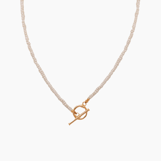 White pearl choker with toggle clasp in gold