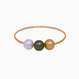multicolor pearl bangle, tahitian pearls and golden south sea pearls float on gold bangle