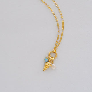Triton Shell Charm