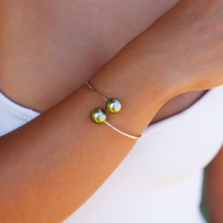 Pistachio Pearl Cuff in Gold on wrist