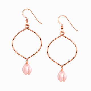 A pair of rose gold dangle earrings with a twisted wire teardrop frame and a small pink pearl flower drop, shown on a plain white background.