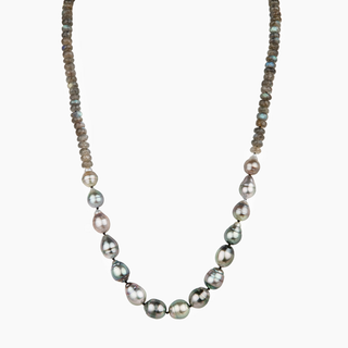 A necklace featuring semi-baroque pastel and multicolor natural Tahitian pearls, knotted and strung with 5mm faceted genuine Labradorite rondelles, with a 14kt Gold Filled Filigree Clasp.