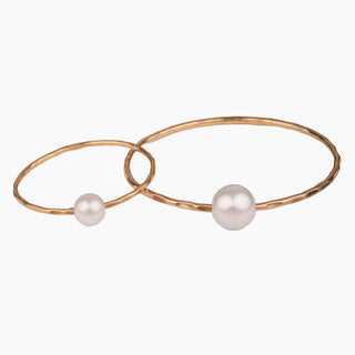 Mom and daughter matching white pearl bangles in gold