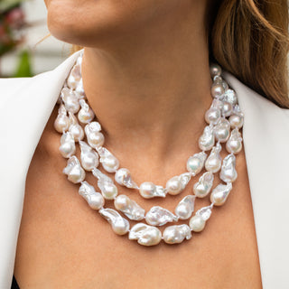 White Flameball Pearl Strand with gold clasp on model